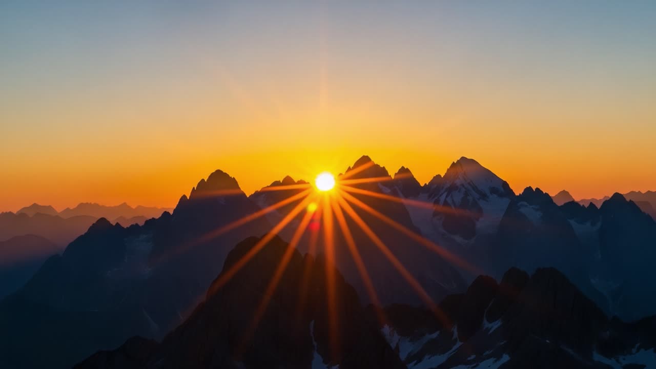 Breathtaking Sunset over Majestic Mountain Peaks