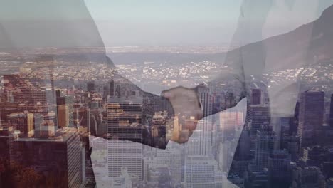 Animation-of-business-handshake-and-cityscape