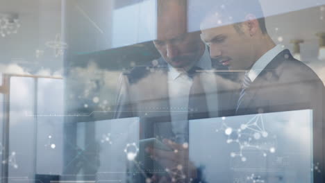molecular structures over two caucasian businessmen using digital tablet against clouds in the sky