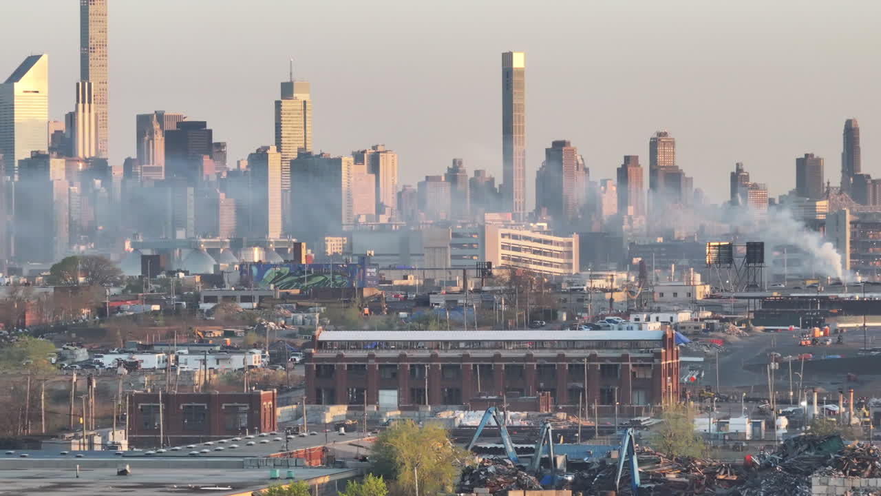 Aerial view of a fire in Queens. Shot in New York City with the Manhattan skyline in the background.