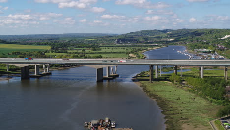 Wide-aerial-view-of-Medway-Viaducts,-carrying-the-M2-motorway-and-High-Speed-train-line-over-the-River-Medway,-Kent,-UK