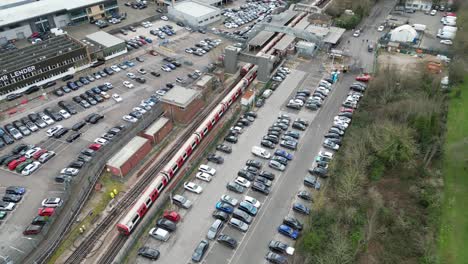 london underground tube train on central line debden essex uk overhead birds eye view aerial drone