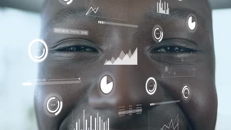 Animación-Del-Procesamiento-De-Datos-Financieros-Sobre-Un-Hombre-De-Negocios-Afroamericano-Sonriendo-En-La-Oficina