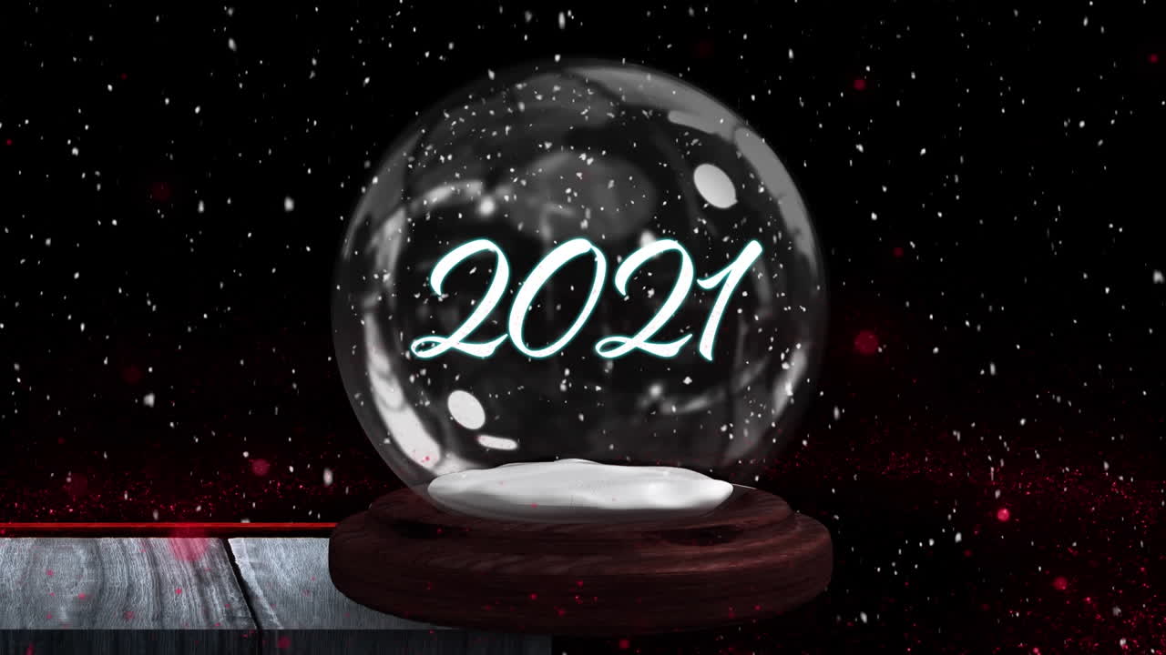 animación de nieve cayendo sobre un globo de nieve con texto de 2021 en fondo negro