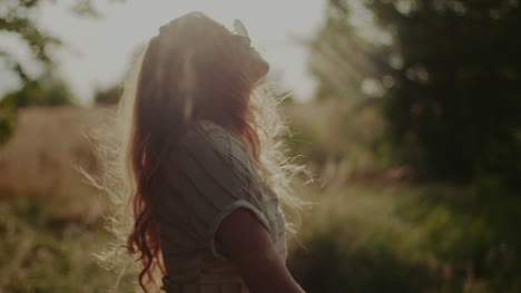 Happy-Attractive-Joyful-Woman-Hippie-Dancing-And-Walking-In-The-Sun-5