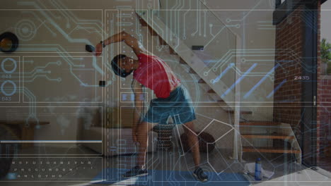animación de datos en pantalla digital sobre hombre afroamericano haciendo ejercicio en casa