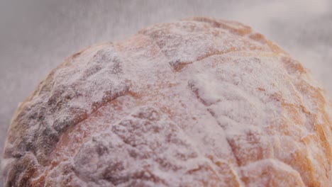 freshly baked natural bread is on the kitchen table.