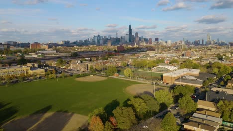 establishing aerial shot of harrison park on chicago's west side