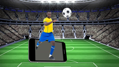 Animation-of-football-player-kicking-ball-over-smartphone-and-sports-stadium