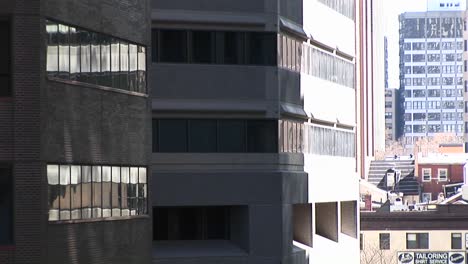 a look at a corner of a building in shadow