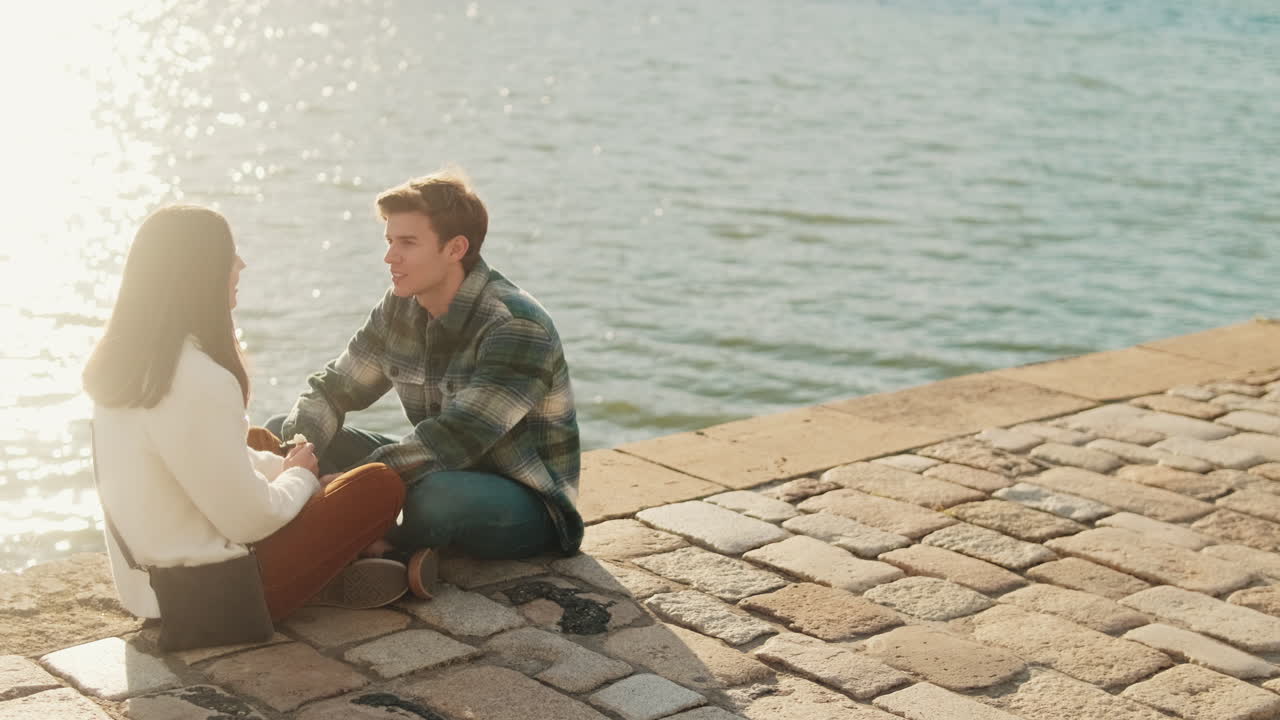 Young Couple next to the River in Seville