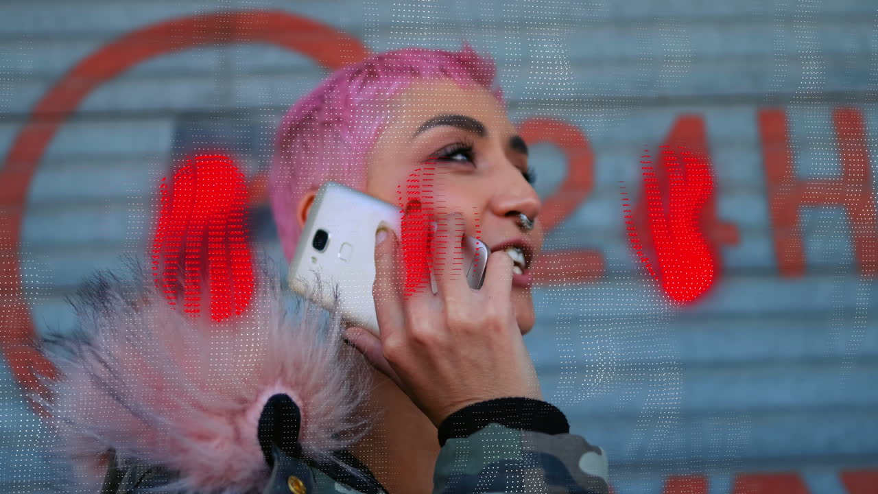 Woman chats on phone amidst digital network outside store.