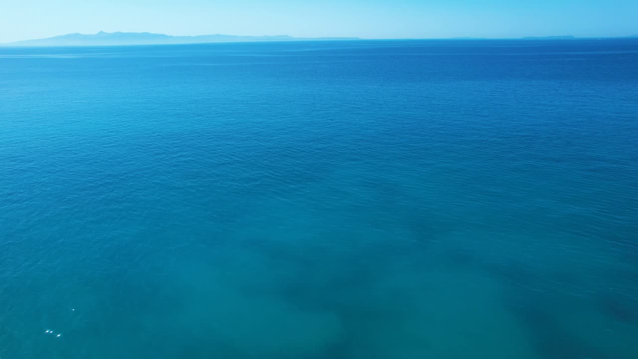 Beach Bar and Palm Garden Resort on White Pebble Shore beside Ionian Blue Sea Albania