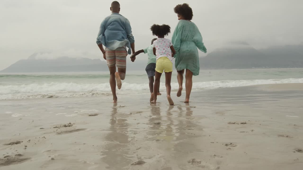 Family enjoying free time by the sea