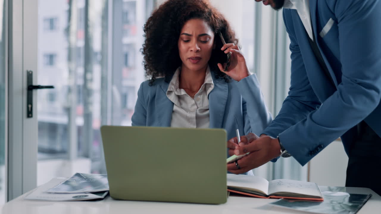 Businesswoman working at her desk