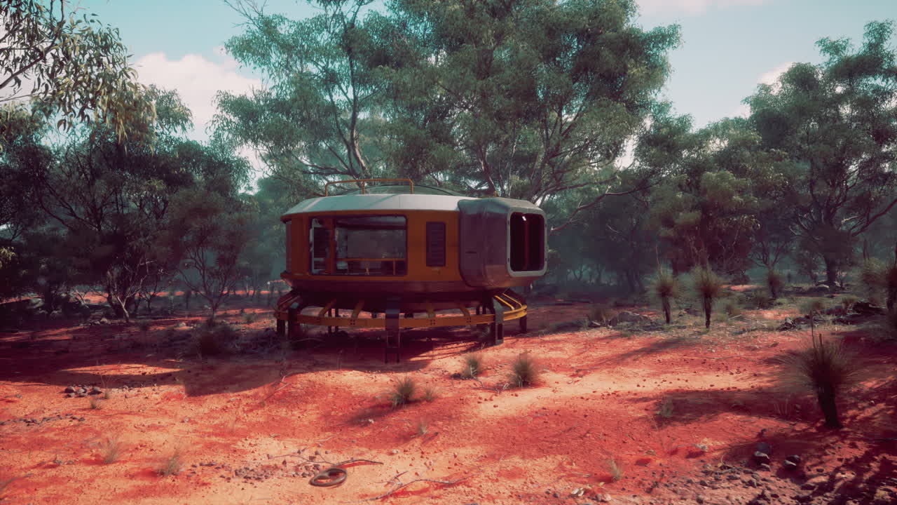 사막 풍경에 있는 미래의 우주선