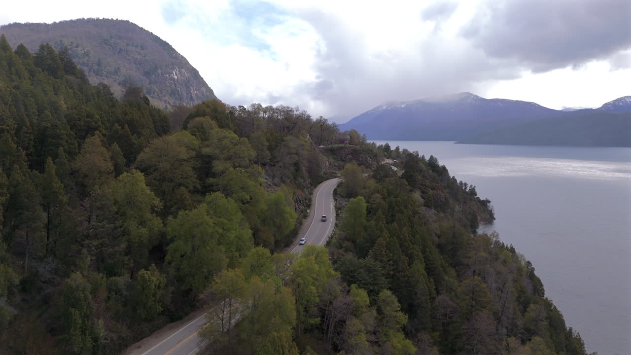 Aerial View of Scenic Road along Mountain Lake