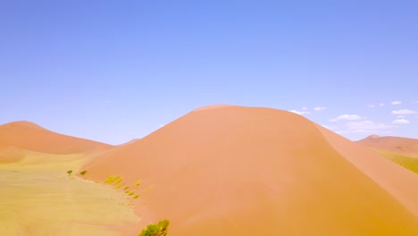 Aerial-over-rugged-desert-landscape-and-sand-dunes-near-Dune-45-in-Namibia-Africa