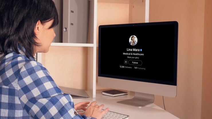 Woman Searching and Following a Profile on Social Media