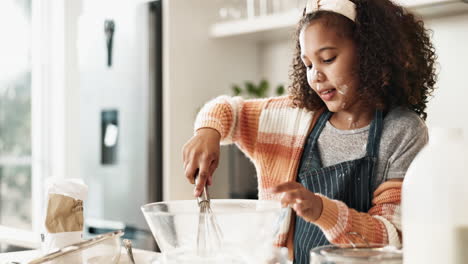 girl having fun baking in the kitchen