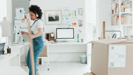 happy woman dancing in a busy office