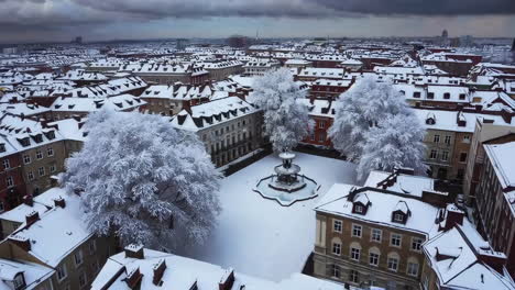 snowy cityscape aerial view of a town square