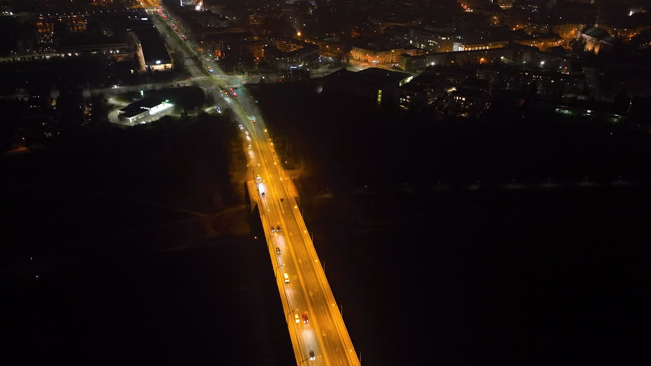 Night Aerial View of a City Bridge and Roads