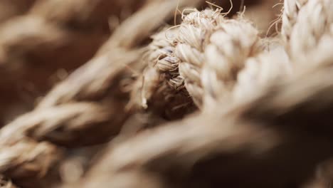 Micro-video-of-close-up-of-brown-threads-with-copy-space