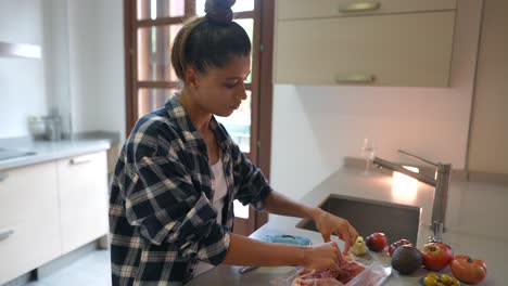 woman preparing a meal in a kitchen