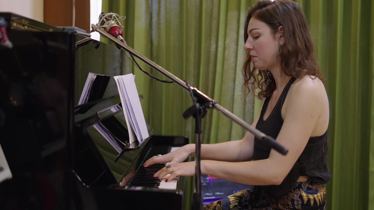 Woman Playing Piano with Microphone