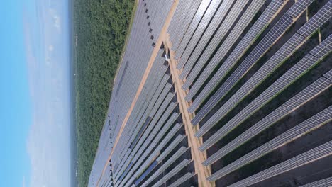 Vertical orbit shot of Photovoltaic park with solar panels in Cumayasa, La Romana, Dominican Republic