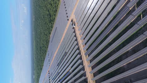 vertical orbit shot of photovoltaic park with solar panels in cumayasa, la romana, dominican republic