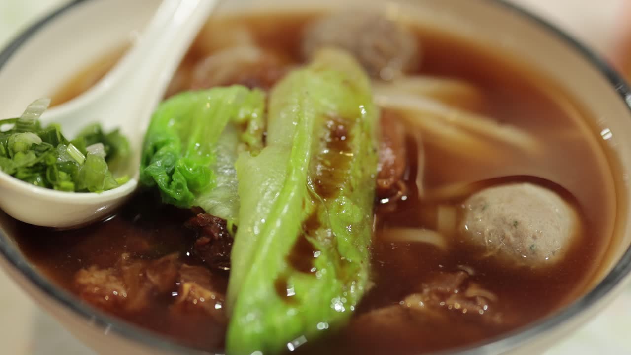 Savory soup with pork balls and vegetables