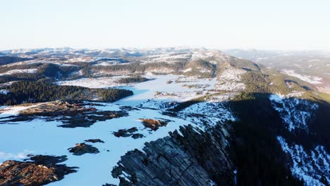 steep snow valley on sunny day in blaheia mountain hike, norway