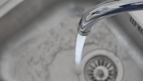 water tap in a kitchen sink