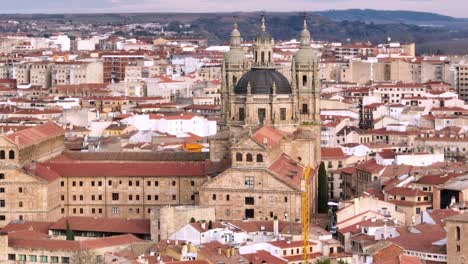 helis shot of famous church in center of old beautiful town of salamanca, spain