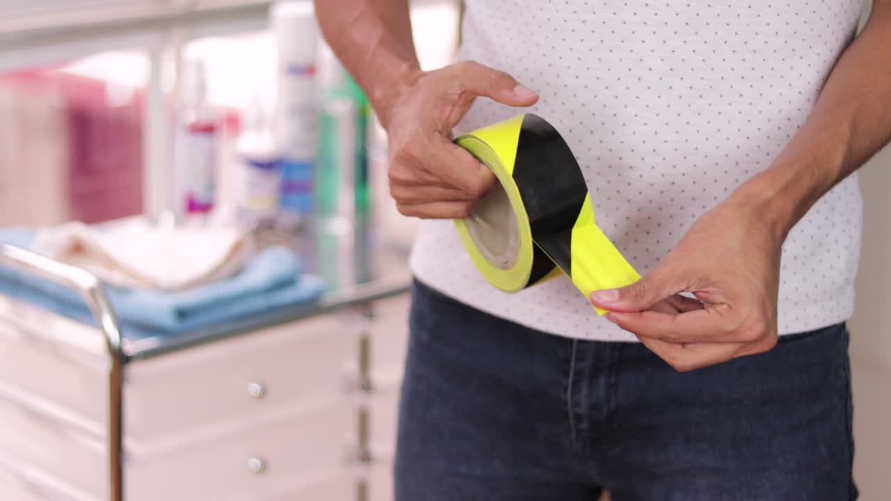 Latino model using safety stripe tape