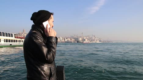 young man talking with smartphone