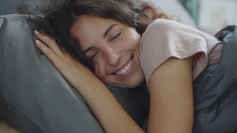 woman waking up in bed