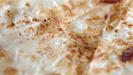 close-up of roti or similar flatbread