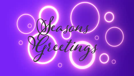 animation of seasons greetings text over neon circles on blue background