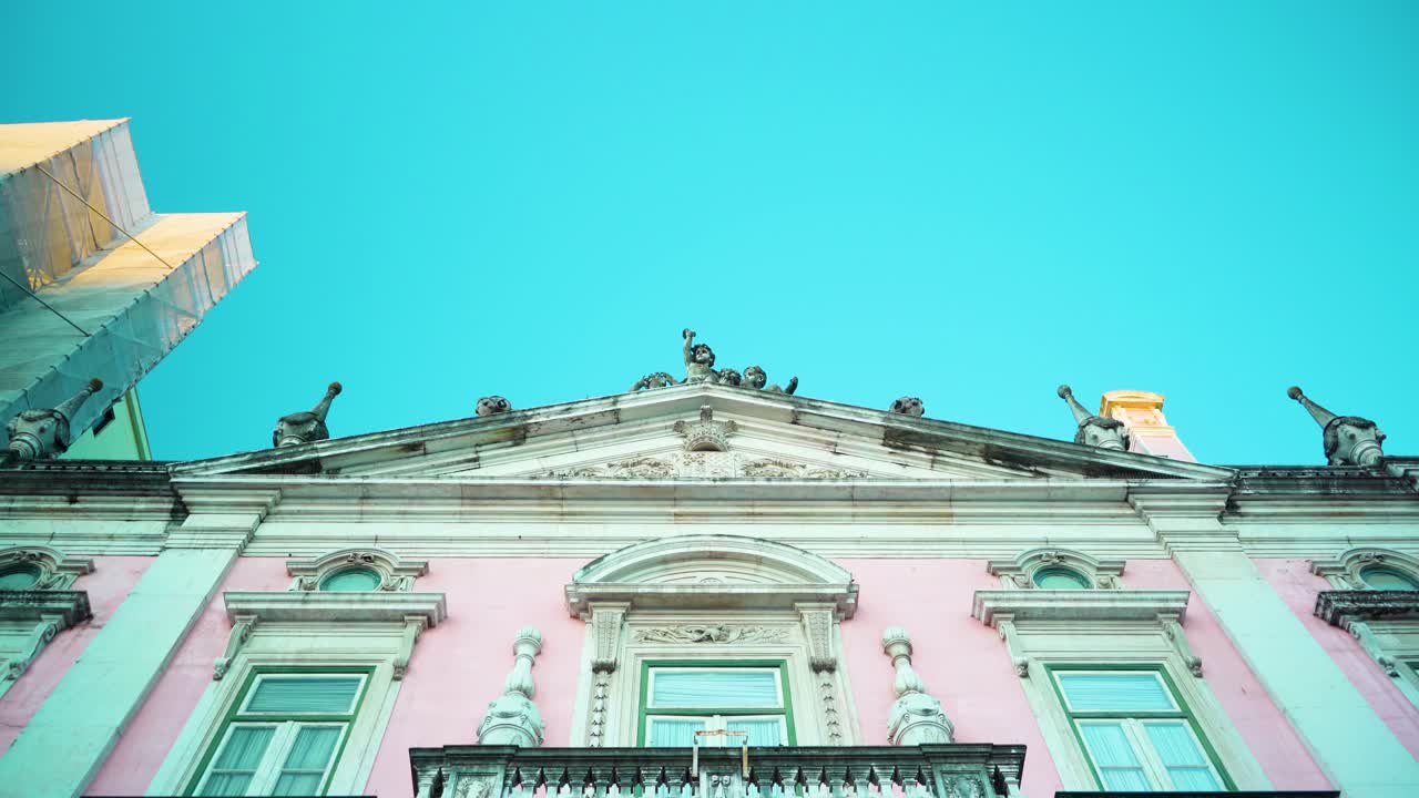 Pink Building Facade with Ornate Details