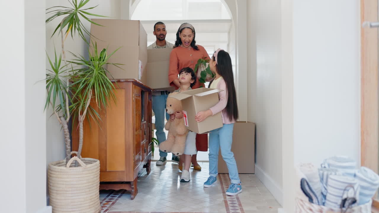 Real estate, family and children carrying boxes