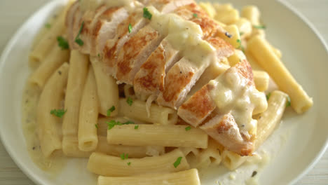 homemade-quadrotto-penne-pasta-white-creamy-sauce-with-grilled-chicken