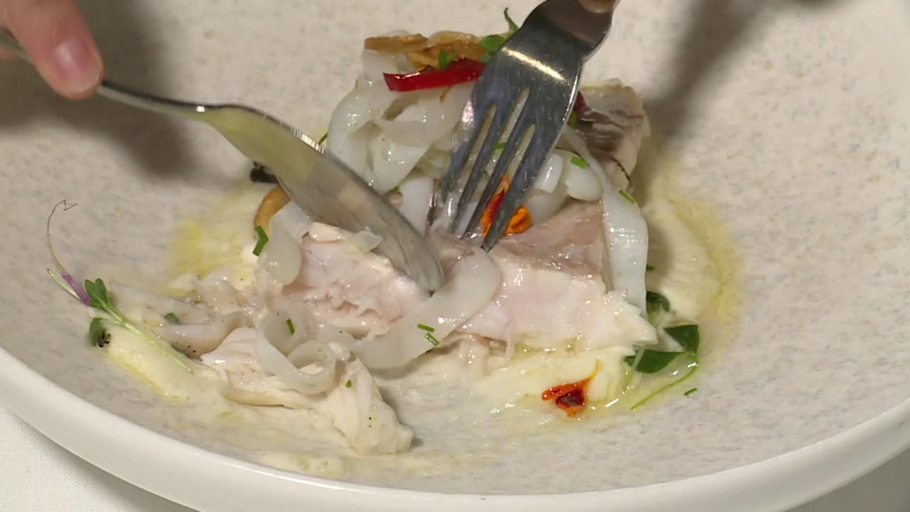 Gourmet Fish Dish with Vegetables and Sauce