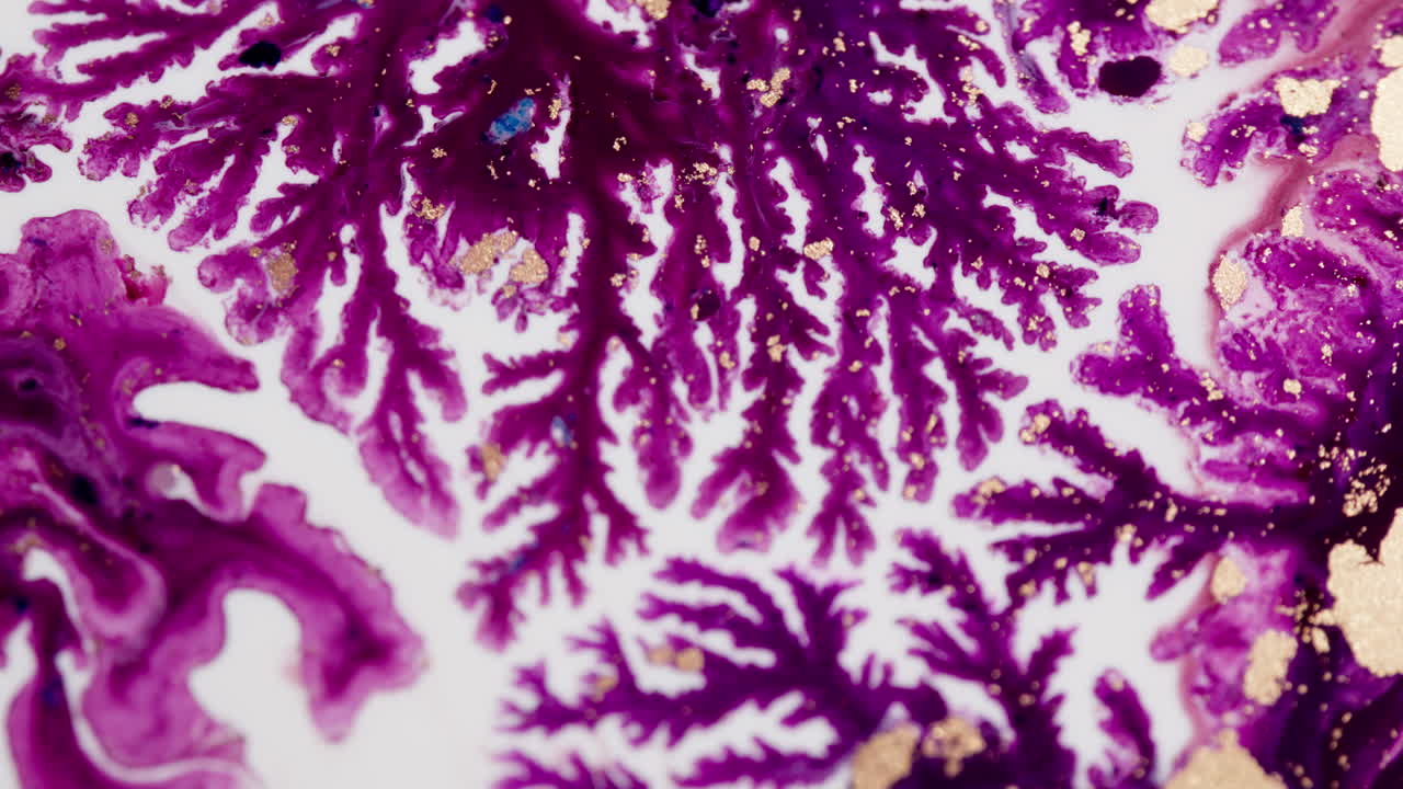Vibrant fractal ink patterns on light backdrop, evoking creativity and wonder in purple and magenta colors