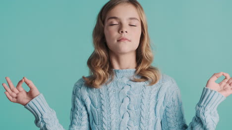 teenage caucasian girl relaxing in front of the camera.