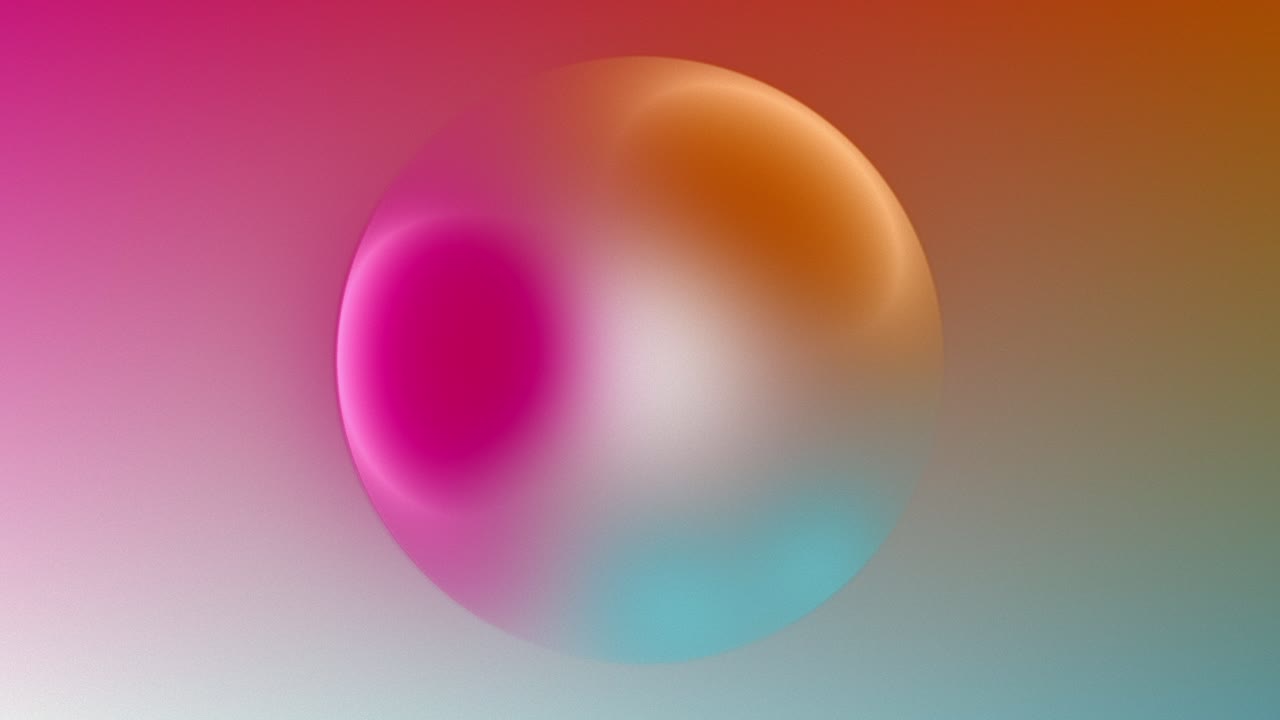 An animation of a luminous pastel sphere in vivid pink, yellow, and teal colors floats at the center, while its surface continuously shifts and morphs in a continuous loop