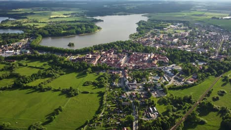 aerial view of a small historic town of trebon surrounded by protected landscape area with a muddy pond and rich fauna and flora