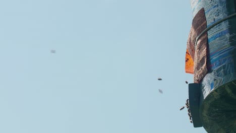 bees flying around a structure
